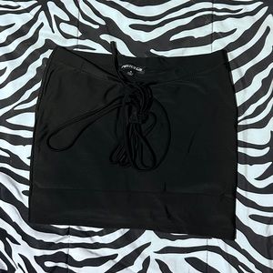 Black mini skirt.